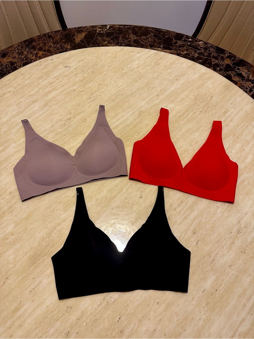 New Set of Three Wireless Comfort Push-Up jelly Bra in Red, Black, and Taupe.